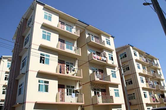 Former slum dwellers in Myanmar’s largest city enjoy new housing