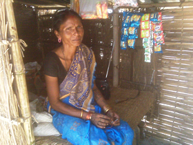 Sitting in a her own shop